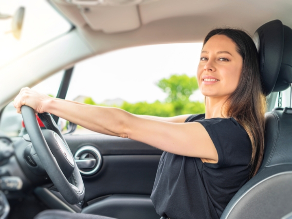 Woman Driving a Car