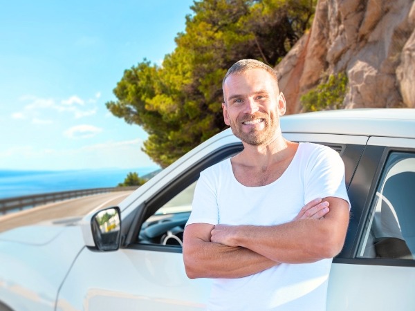 Man with a White Car
