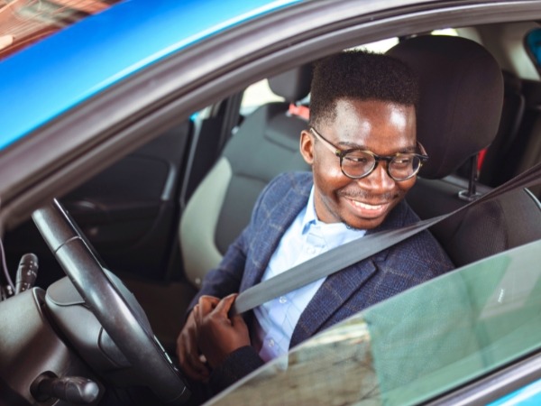 Man Driving a Car